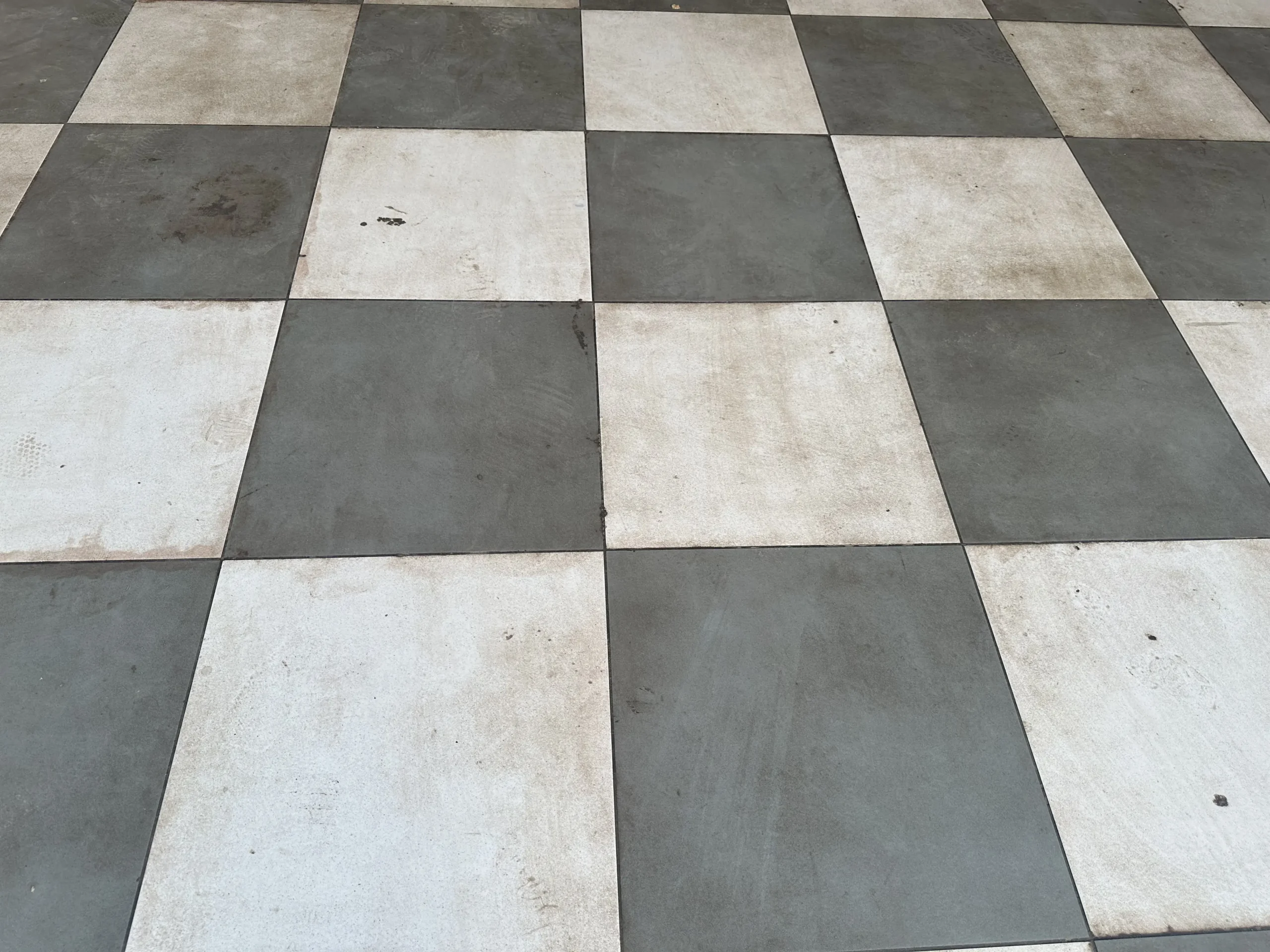 What are the disadvantages of vitrified floor tiles?